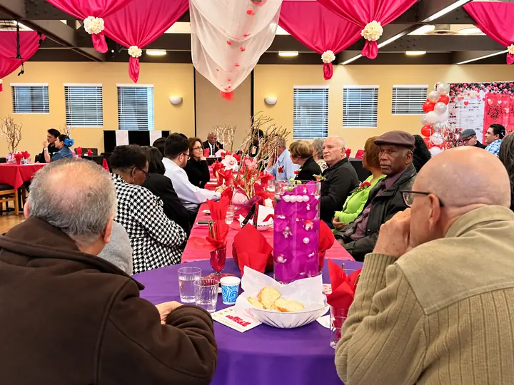 Fellowship hall arranged with long banquet tables