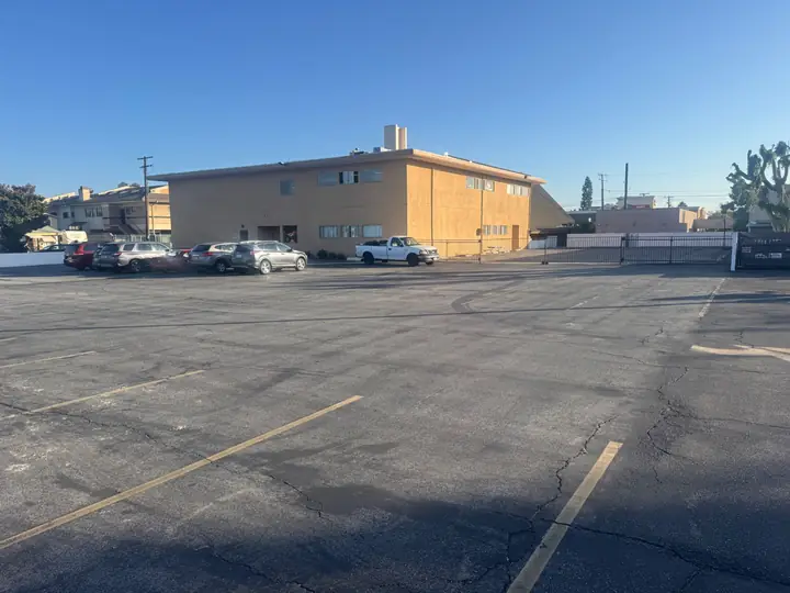 Wide view of the on-site parking lot beside the church fellowship building