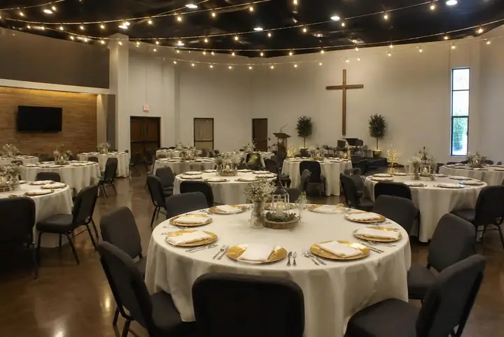 Open floor of the fellowship hall before tables and chairs are set